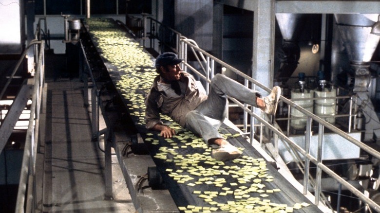 Charlton Heston on Soylent Green conveyer belt