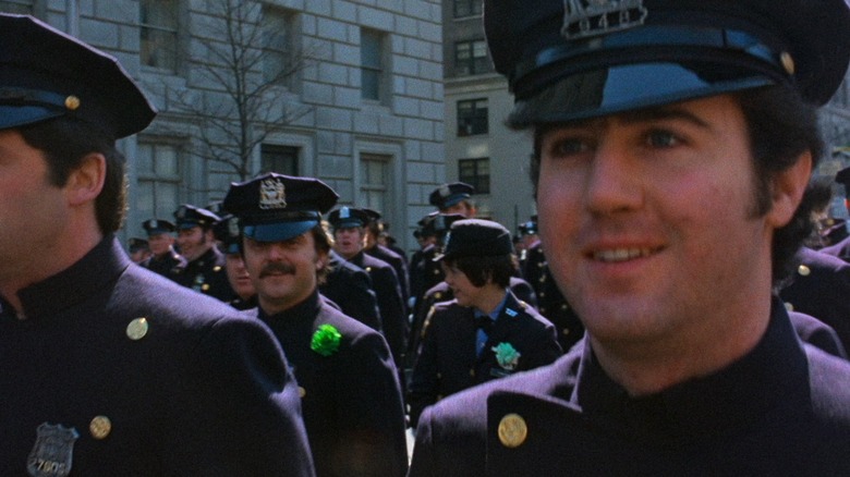 Willekeurige agent gespeeld door Andy Kaufman in God Told Me To