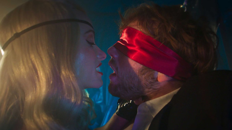 Erika and a blindfolded Elliot in I Want Your Sex