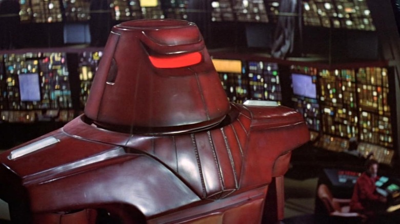 Maximilian standing at attention in The Black Hole