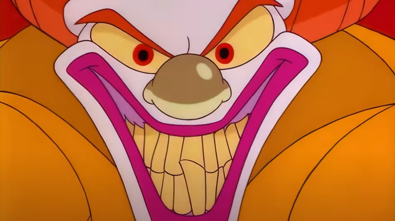 An evil clown telling Toaster to run in The Brave Little Toaster