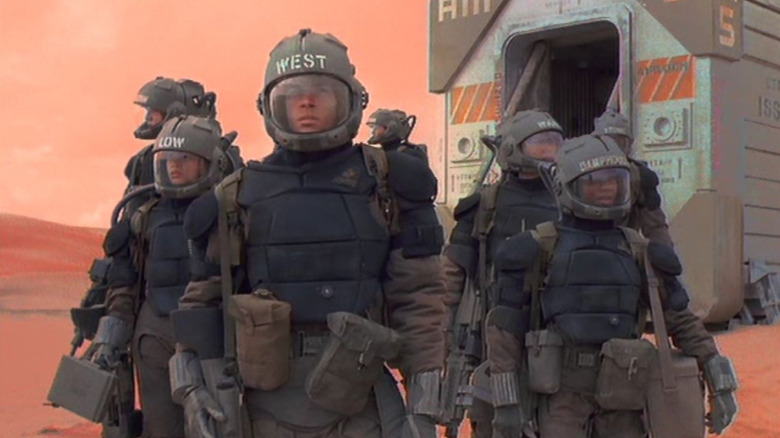 Low, West, and several other Woldcars in spacesuits on Space: Above and Beyond