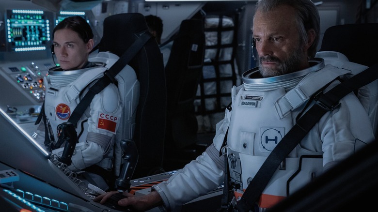 Cosmonauts Svetlana and Ed Baldwin inside a spacecraft in season 4 of For All Mankind