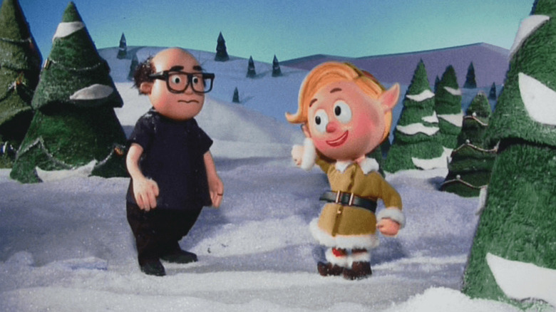 A stop-motion puppet of Frank Reynolds (Danny DeVito) talks to an elf in It's Always Sunny in Philadelphia