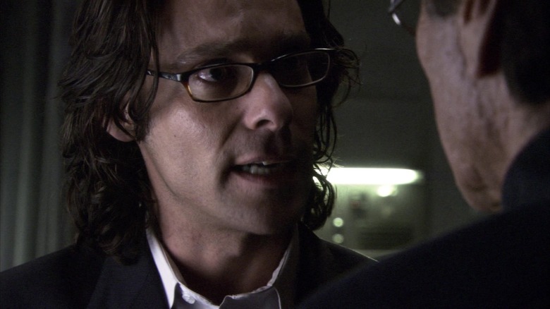 Dr. Baltar talking to Commander Adama in Battlestar Galactica