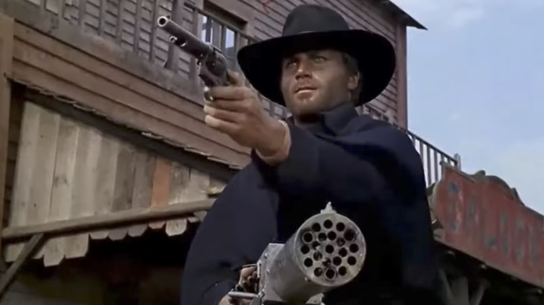 Django with a pistol and a machine gun in Django