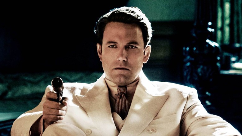 Live By Night (2016) poster - Ben Affleck as Joe Coughlin pointing a gun forward