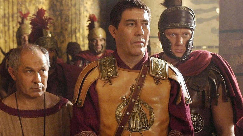 Julius Caesar surveys the room alongside Lucius Vorenus in HBO's Rome