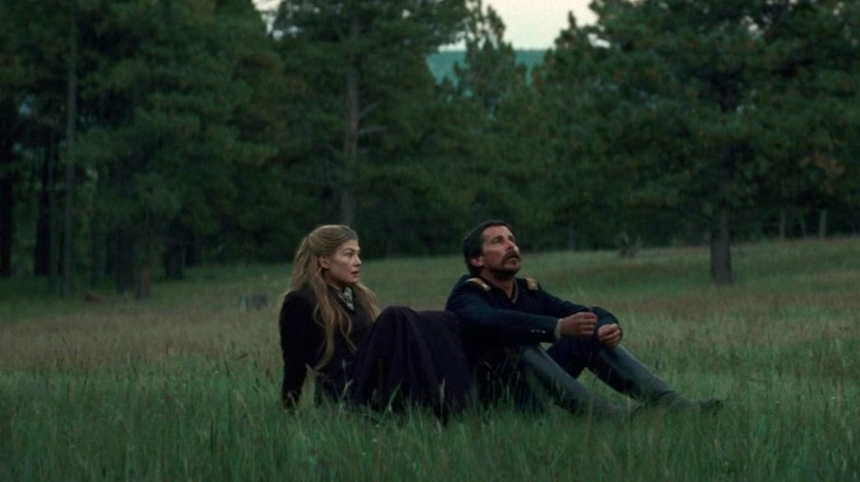Rosamund Pike and Christian Bale in hostility