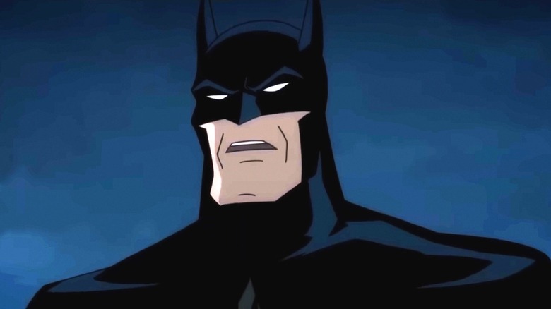 Batman stands against a night sky in Batman The Killing Joke