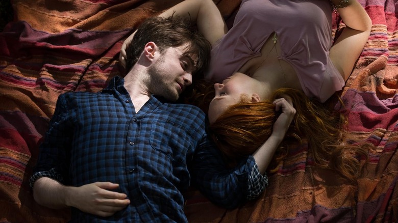 Ig and Merrin snuggling on a blanket in Horns