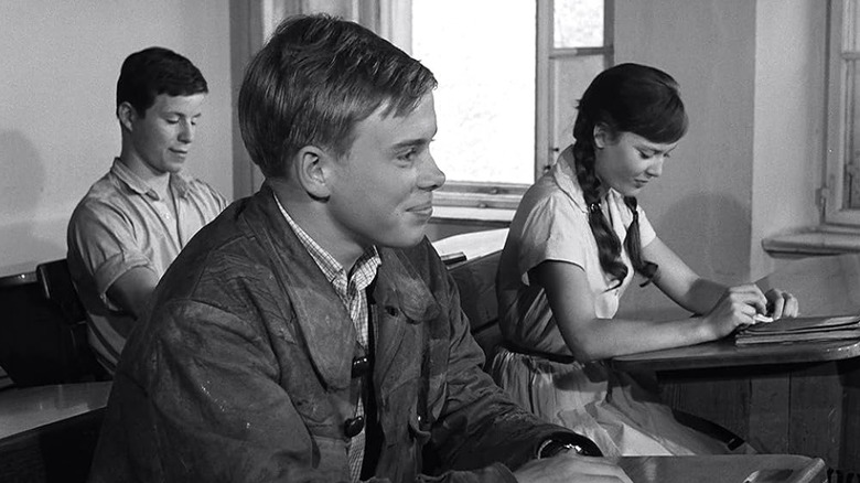 Two boys and a girl in a high school class in The Bridge