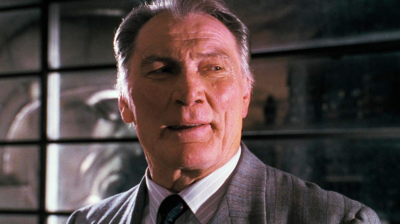 Jack Palance's Carl Grissom looks off to his left in closeup in Batman