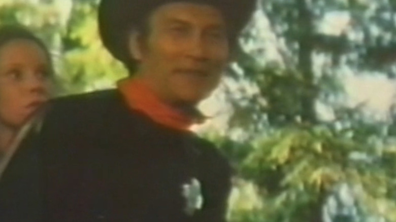 Jack Palance's Frendlander rides a horse with Samantha Eggar's Katherine in Welcome to Blood City