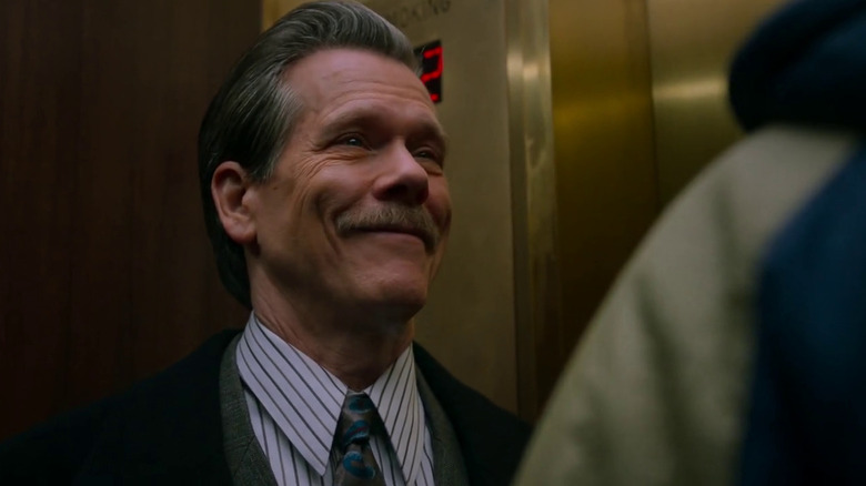Kevin Bacon smiling devilishly as Jackie Rohr in City on a Hill