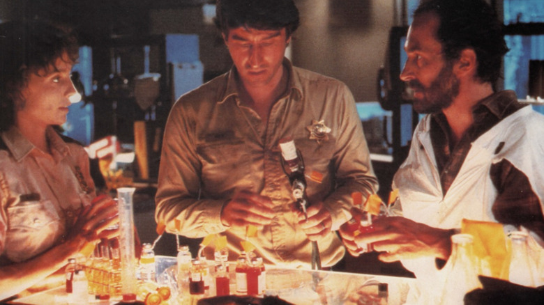 Joanie, Cal, and Dan attempt to find a cure to the virus in Warning Sign