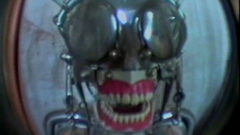 A robot monster with human teeth in Weird TV