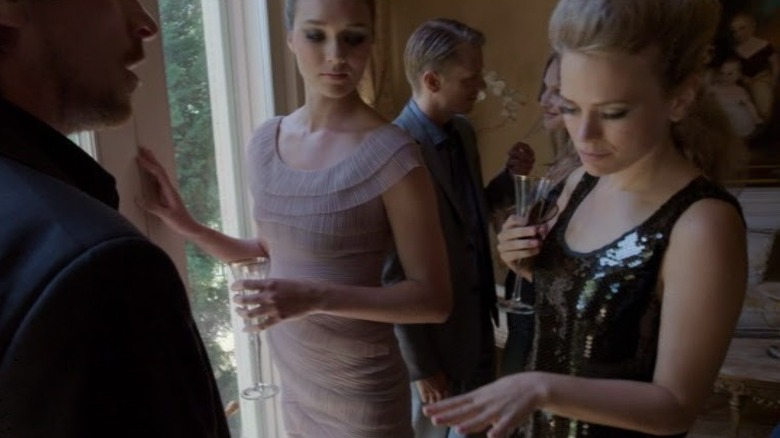 Errol in the background of a party in Knight of Cups