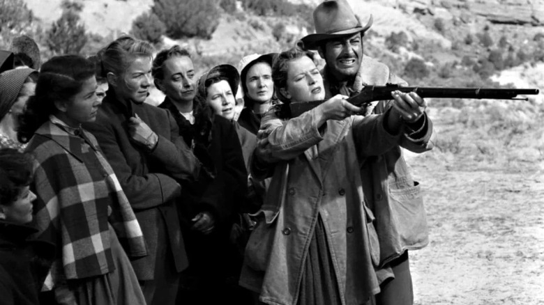 Buck Wyatt teaching some women to shoot in Westward the Women