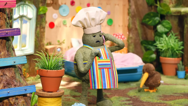 Tiny Chef looks heartbroken as he talks on the phone in The Tiny Chef Show