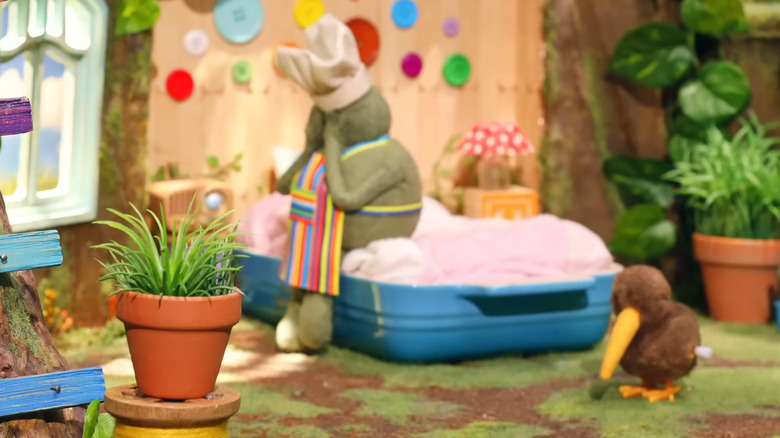 Tiny Chef sits on his bed and cries in The Tiny Chef Show