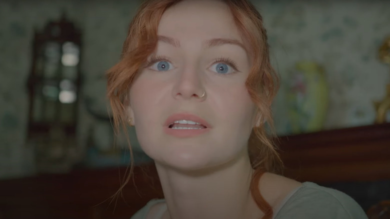 Kris Collins staring into the camera in House on Eden