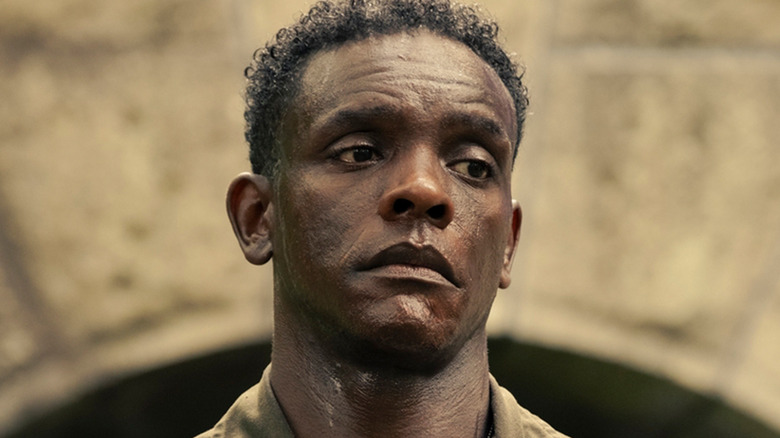 Chris Chalk's Dick Hallorann is seen in closeup as he stands outside in It Welcome to Derry