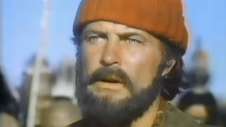 Robert Conrad's Pasquinel is seen in closeup as he stands outside in Centennial