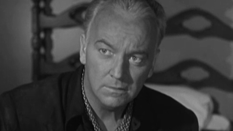William Boyd's Hopalong Cassidy is seen in close up looking off to his right in Hopalong Cassidy