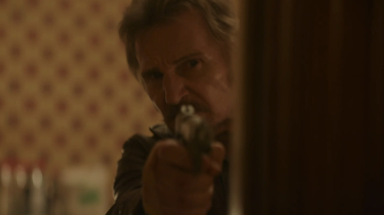 Liam Neeson, the thug, refers to a pistol behind a door in Al -Ghassima