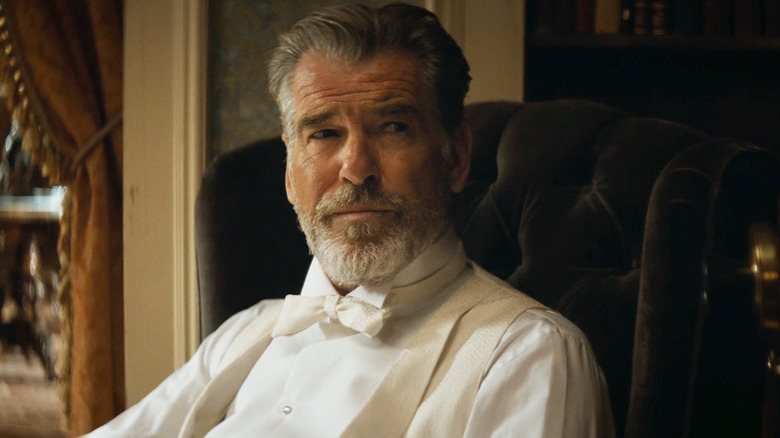 Pierce Brosnan's Eli McCullough sits at his desk in The Son