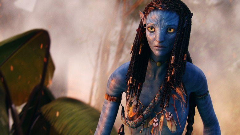 Zoe Saldaña's Neytiri looks mortified in the forests of Pandora in Avatar