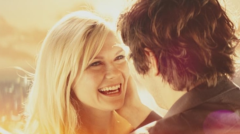 Eden smiling at Adam in Upside Down