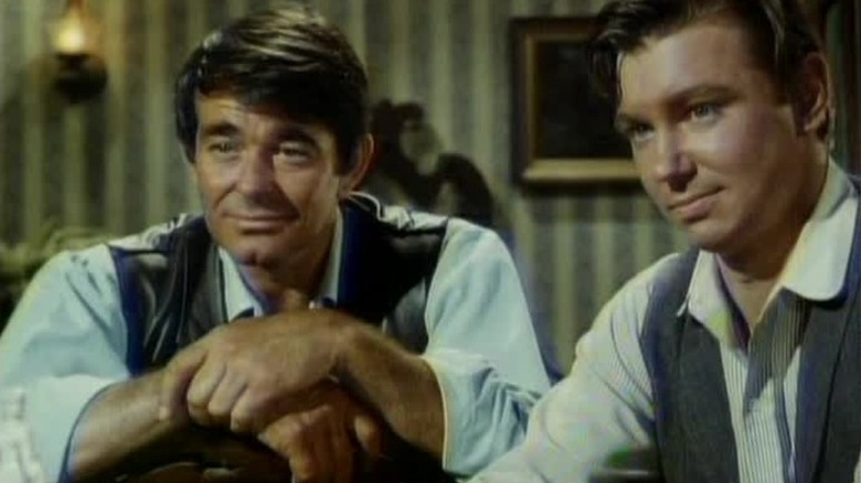 Marshal Jim Crown and Francis at a bar on Cimarron Strip