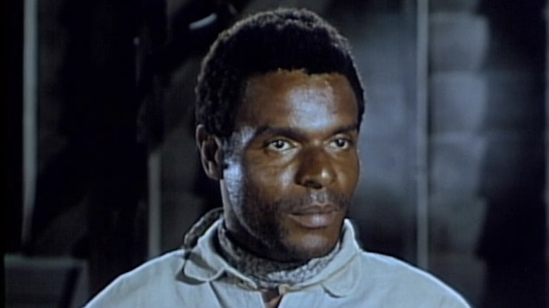 Otis Young's Jemal David is seen in closeup in The Outcasts