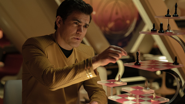 James T. Kirk playing 3-D chess on Star Trek: Strange New Worlds
