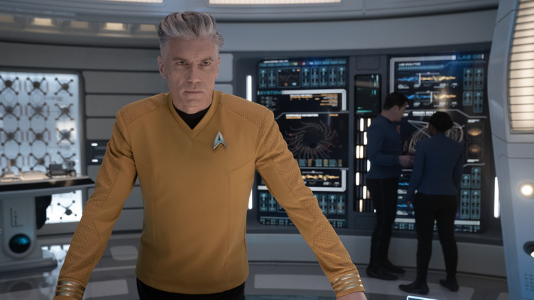 Captain Pike at a computer station in Star Trek: Strange New Worlds