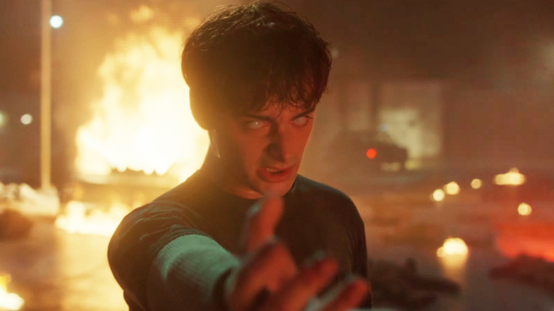 Noah Schnapp's Will Byers holds out his arm during a fight scene in Stranger Things