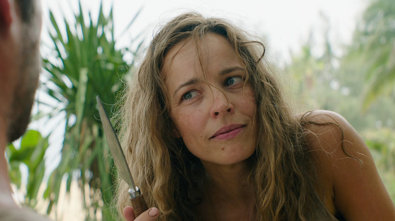 Linda holding a knife up to Bradley in Send Help