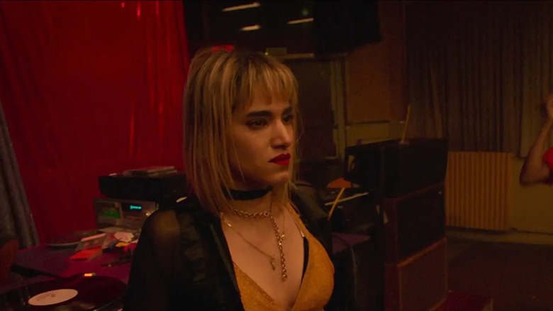 Selva looking sad on a dancefloor in Climax
