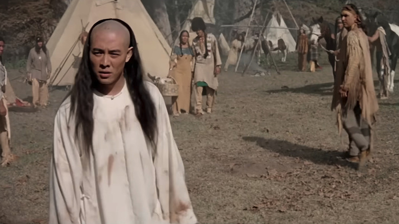 Jet Li's Wong Fei-hung walks through a native American camp looking confused in Once Upon a Time in China and America