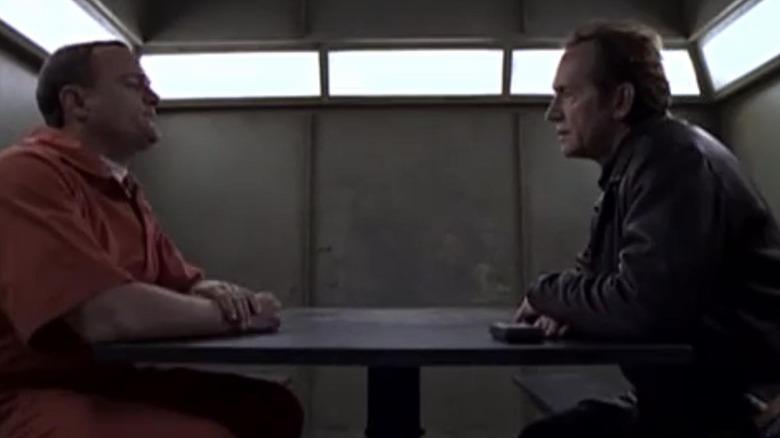 Frank Black interrogating a prisoner in Millennium