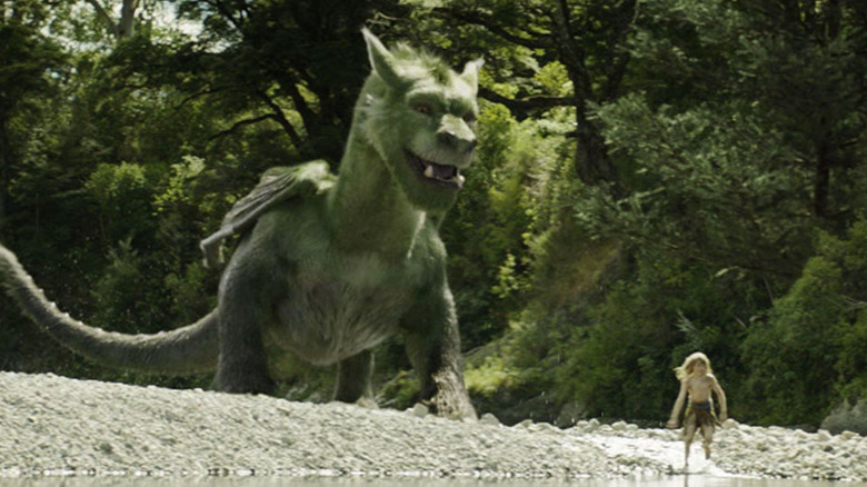 Elliot and Pete (Oakes Fegley) enjoy quality time in the forest in "Pete's Dragon"