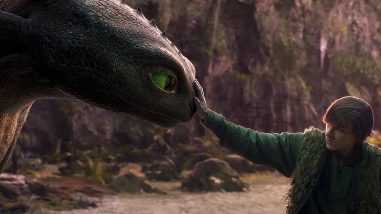 Toothless and Hiccup share a tender moment in "How to Train Your Dragon"