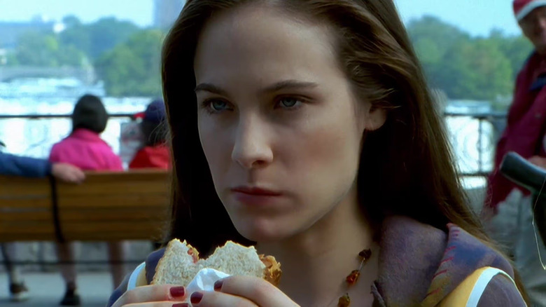 Caroline Dhavernas as Jaye eating a sandwich in Wonderfalls