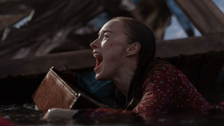 Lisa in the water, screaming, in Thrash