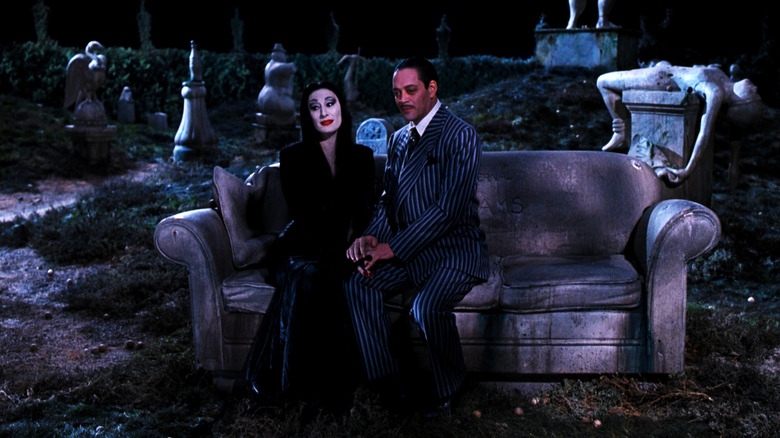 Anjelica Huston and Raul Julia in The Addams Family
