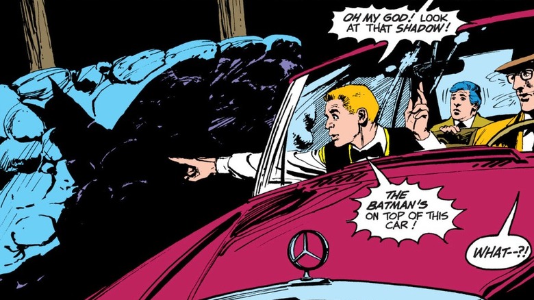 Criminals in a getaway car see Batman's shadow in Night of the Stalker