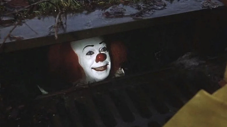 It, Pennywise luring Georgie into the sewer