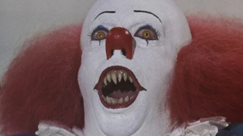 It, Pennywise the Clown showing his fangs